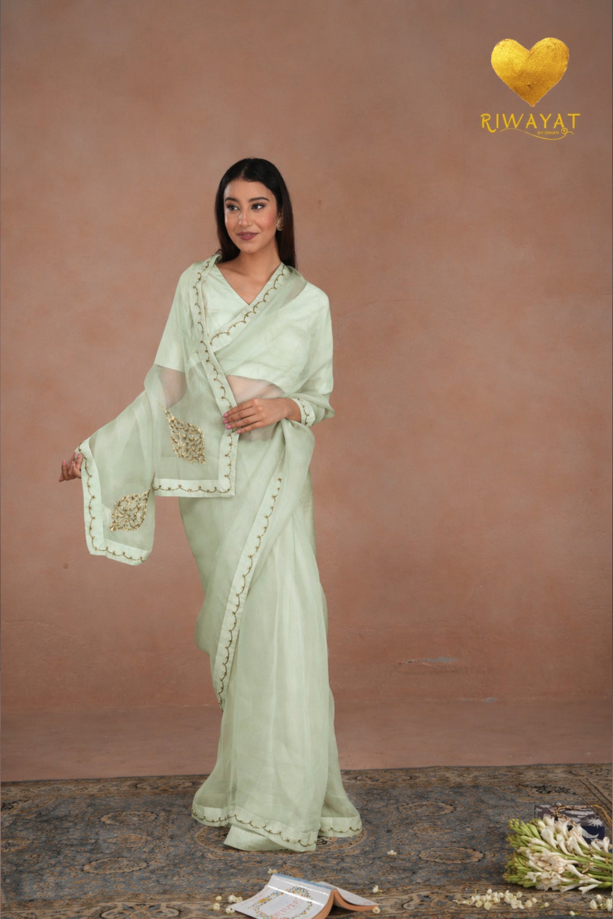 Pastel Green Kashmiri Leaf & Motif Embroidered Organza Saree