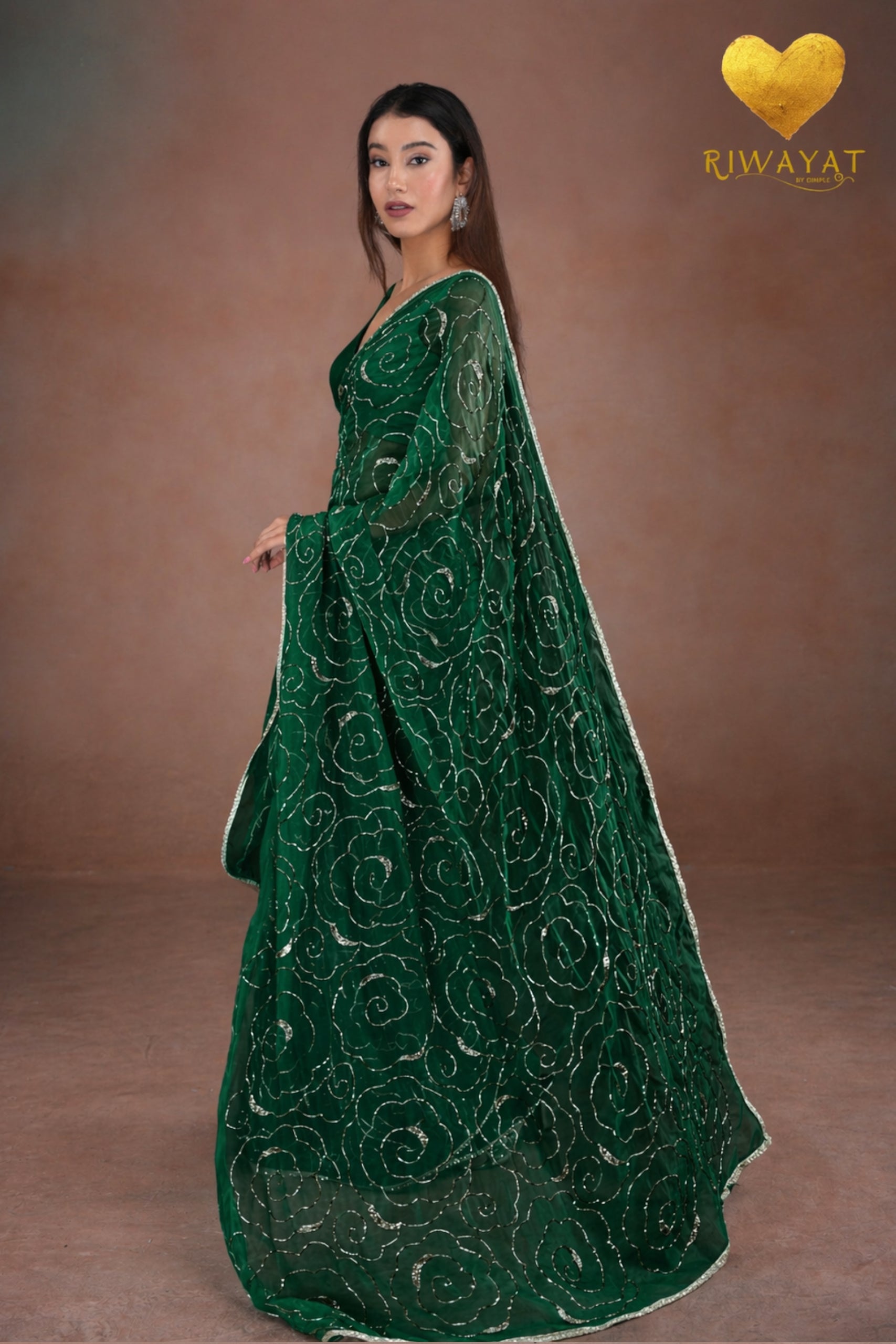 Emerald Green Organza Saree with Floral Swirl Embroidery