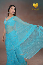 Turquoise Blue Organza Saree with Floral Swirl Embroidery