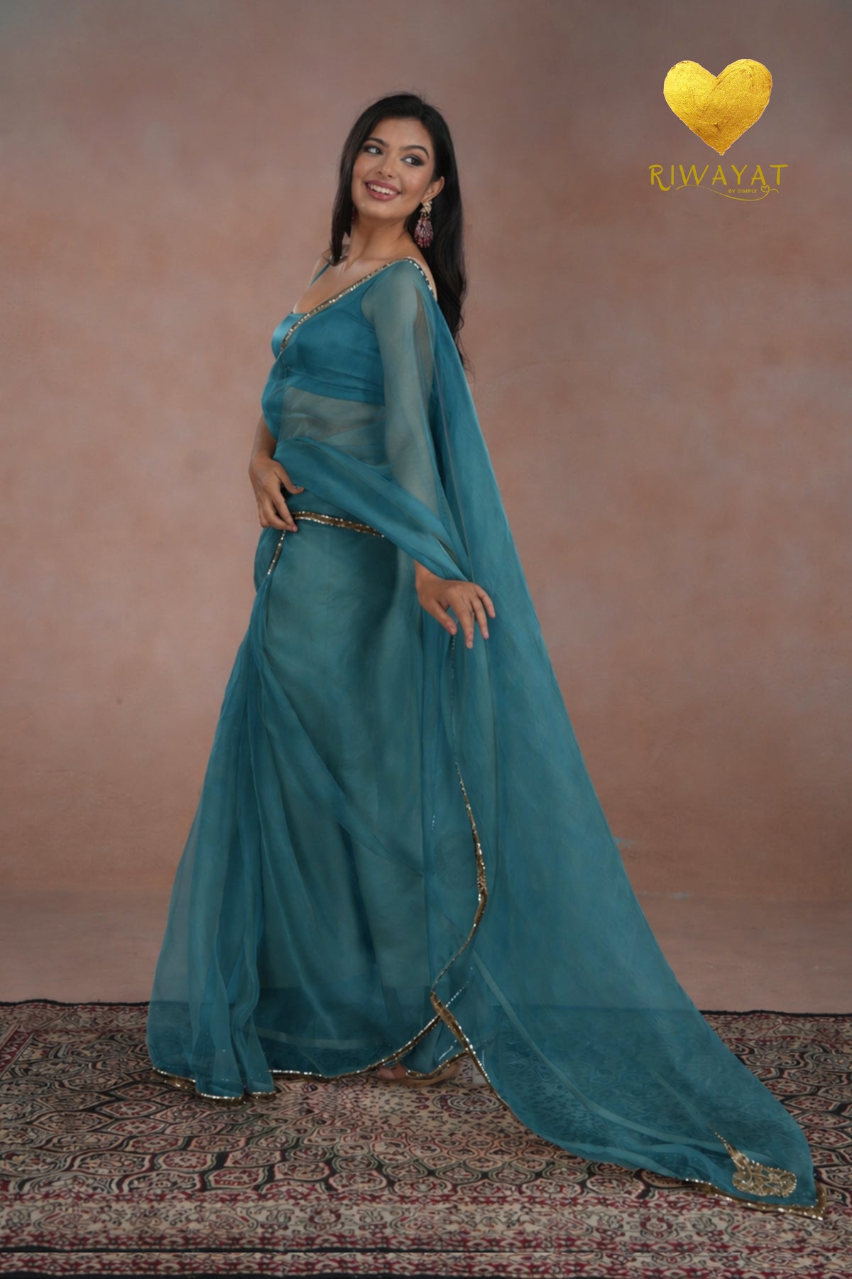 Teal Organza Saree With Golden Brown Cutdana Kashmiri Leaf Hand Embroidery