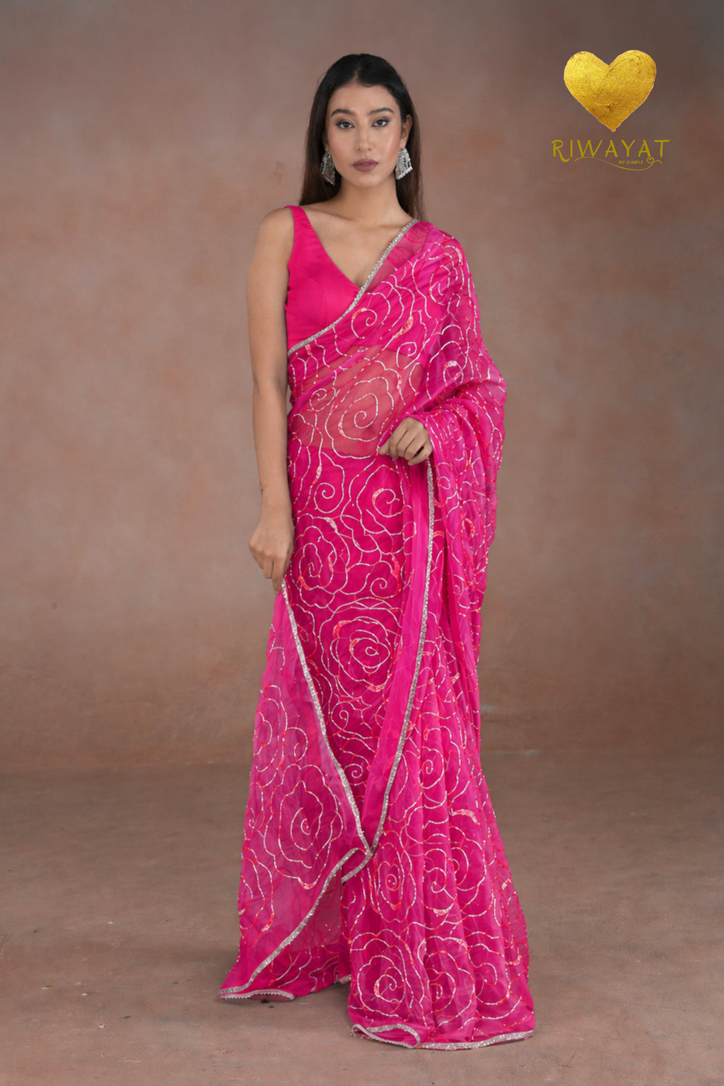 Deep Pink Organza Saree with Floral Swirl Embroidery